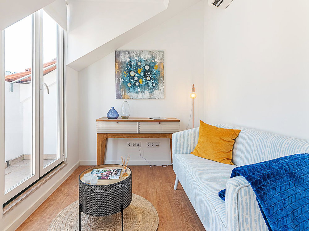 Refurbished and furnished 2 bedroom flat with balcony overlooking the river in São Vicente