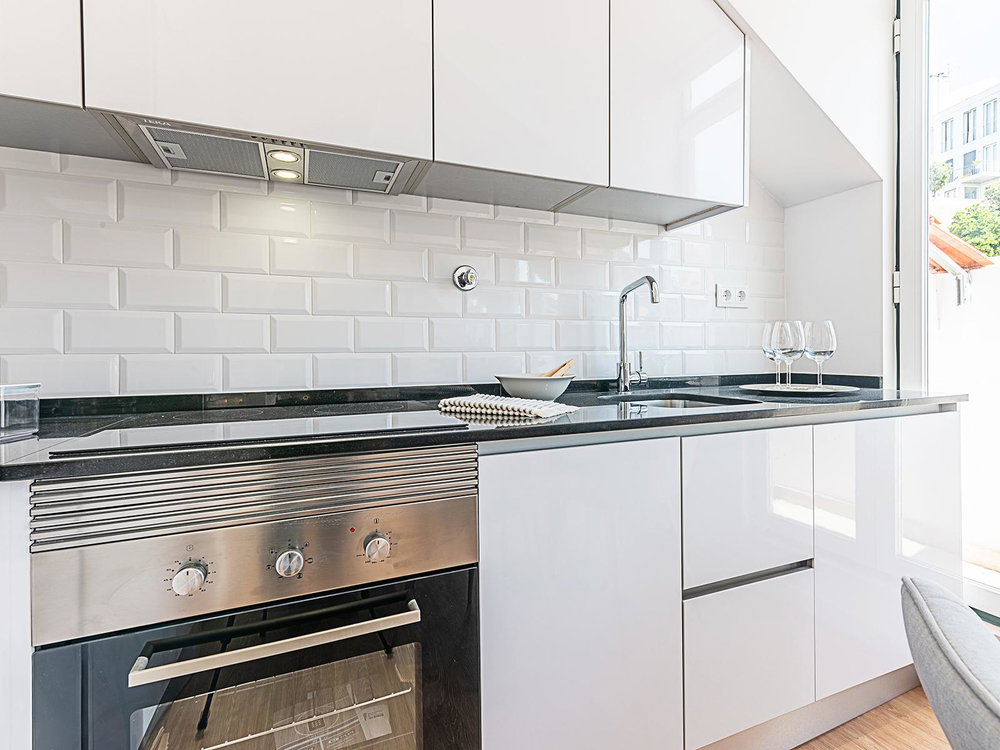Refurbished and furnished 2 bedroom flat with balcony overlooking the river in São Vicente