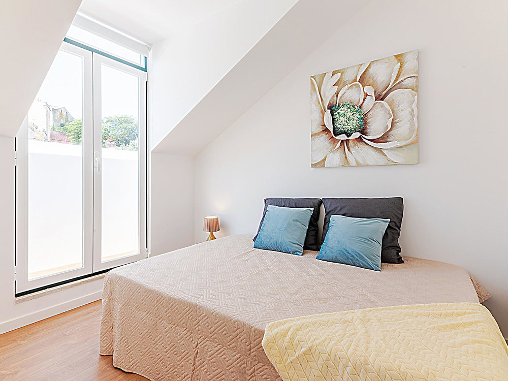 Refurbished and furnished 2 bedroom flat with balcony overlooking the river in São Vicente