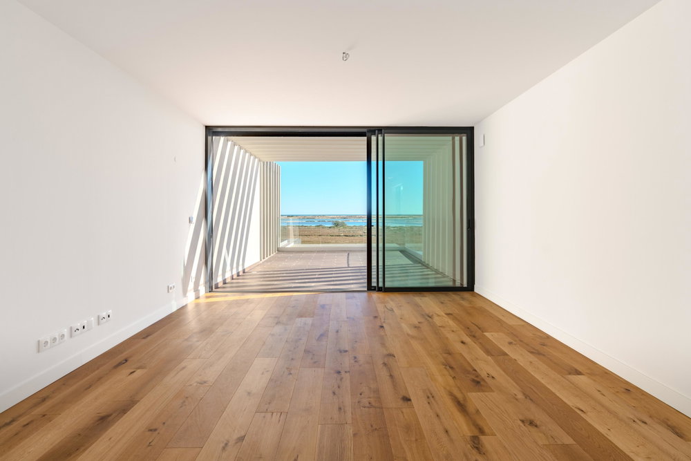 Unique newbuild waterfront apartment in Fuseta – frontline with spectacular Ria Formosa views