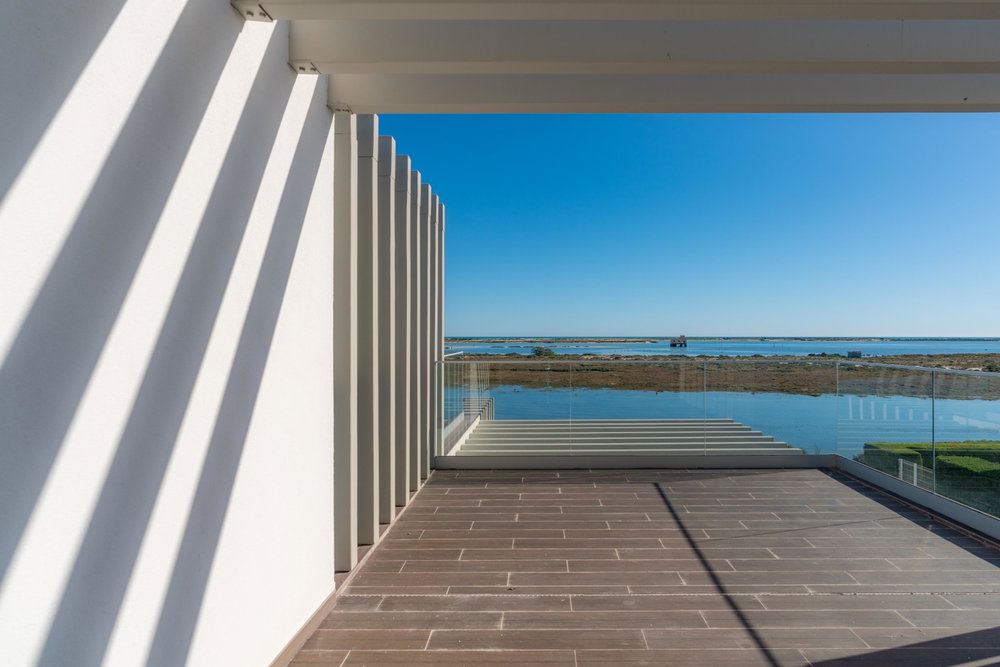 Unique newbuild waterfront apartment in Fuseta – frontline with spectacular Ria Formosa views