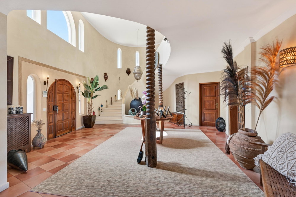 A soulful nine-bedroom estate in the heart of Santa Bárbara de Nexe, commanding breathtaking sea views and offering an extraordinary sense of privacy, tranquillity, and timeless charm.