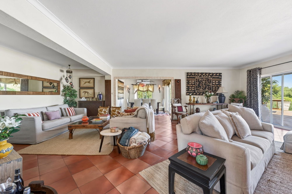 A soulful nine-bedroom estate in the heart of Santa Bárbara de Nexe, commanding breathtaking sea views and offering an extraordinary sense of privacy, tranquillity, and timeless charm.