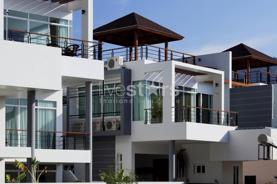 Modern semi-detached pool villas located on a hillside in Kata 3999704525