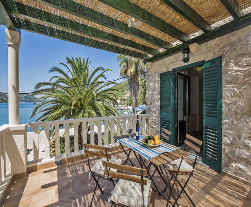 Stone Seafront House on Sipan Island 106709973