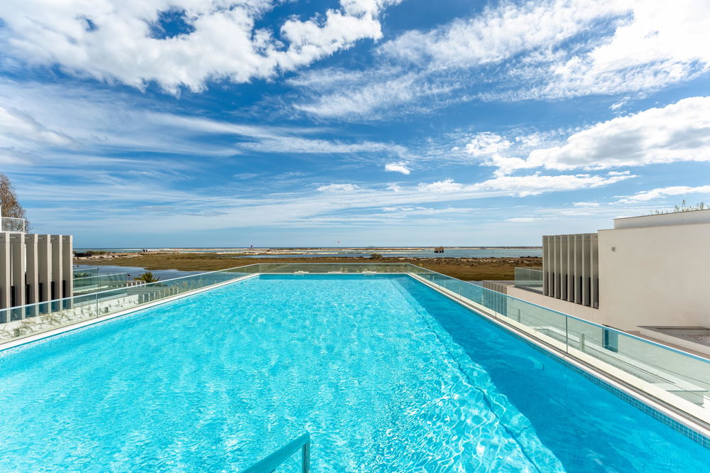 Unique newbuild waterfront apartment in Fuseta – frontline with spectacular Ria Formosa views 356215106