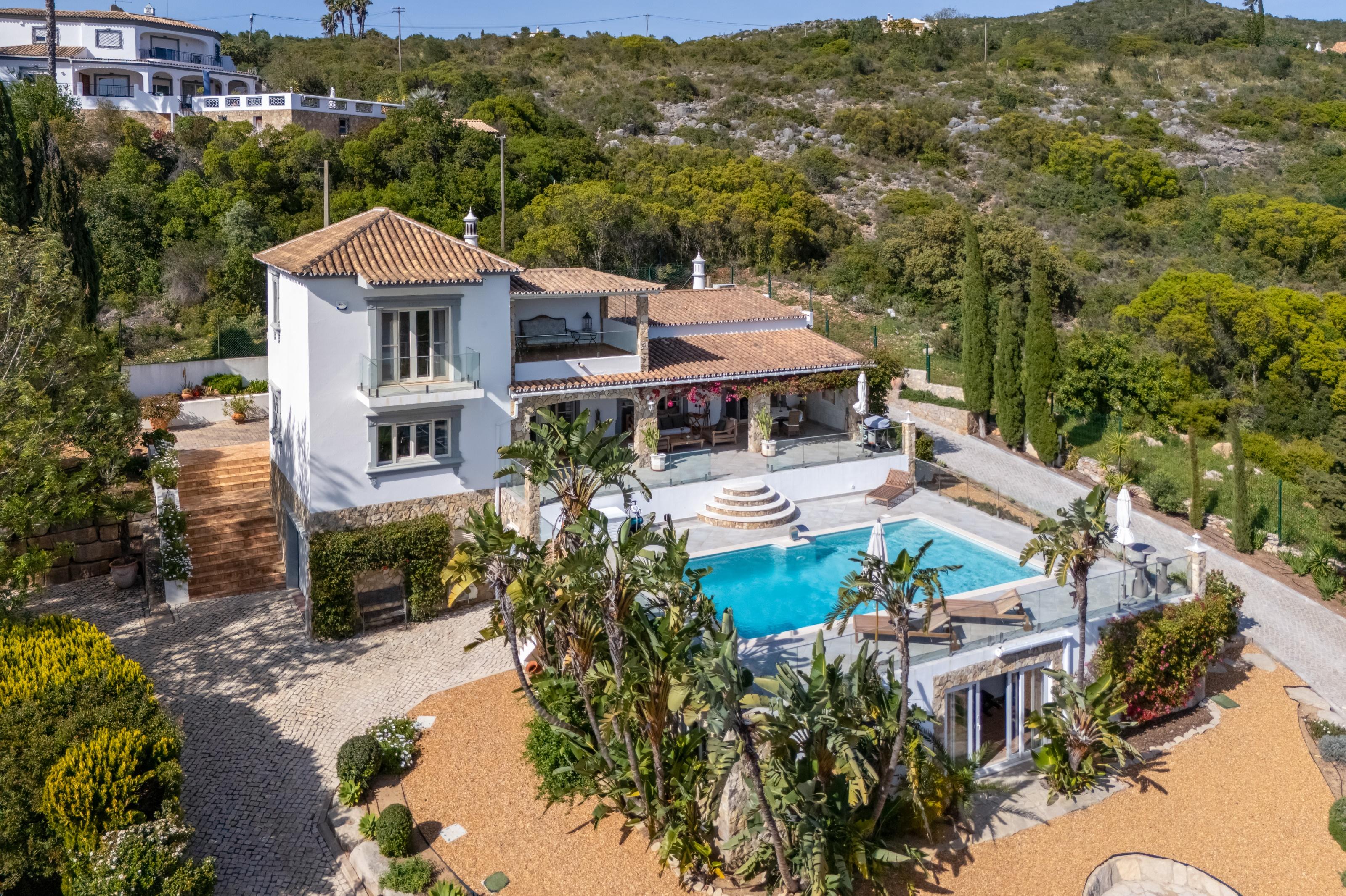 Charming renovated 3 + 1 bedroom villa just moments from the heart of Santa Barbara de Nexe offering stunning sea views and a warm inviting atmosphere.