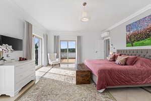 This exquisite four-bedroom en-suite villa is far more than a home, it is a sanctuary of peace and comfort , near the center of Santa Barbara de Nexe. 3634352164
