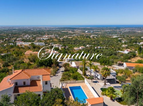 Beautiful 4-bedroom villa with stunning panoramic views of the Algarve coast in Santa Barbara de Nexe 657529975