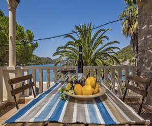 Stone Seafront House on Sipan Island 106709973