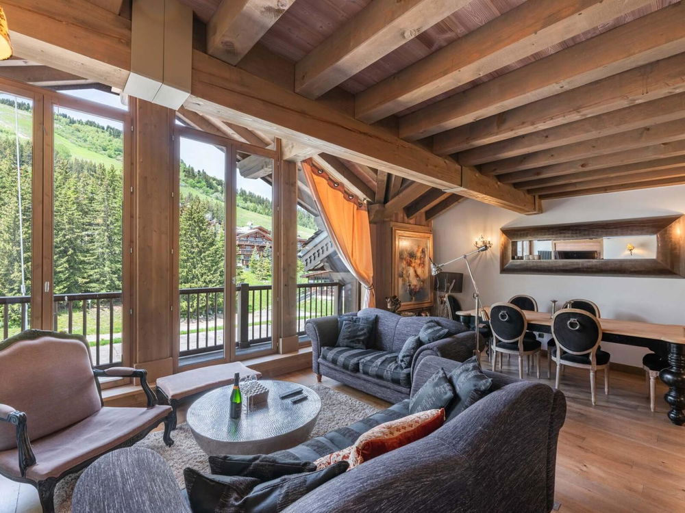 Experience mountain excellence with this prestigious top-floor apartment in Courchevel 2497696208