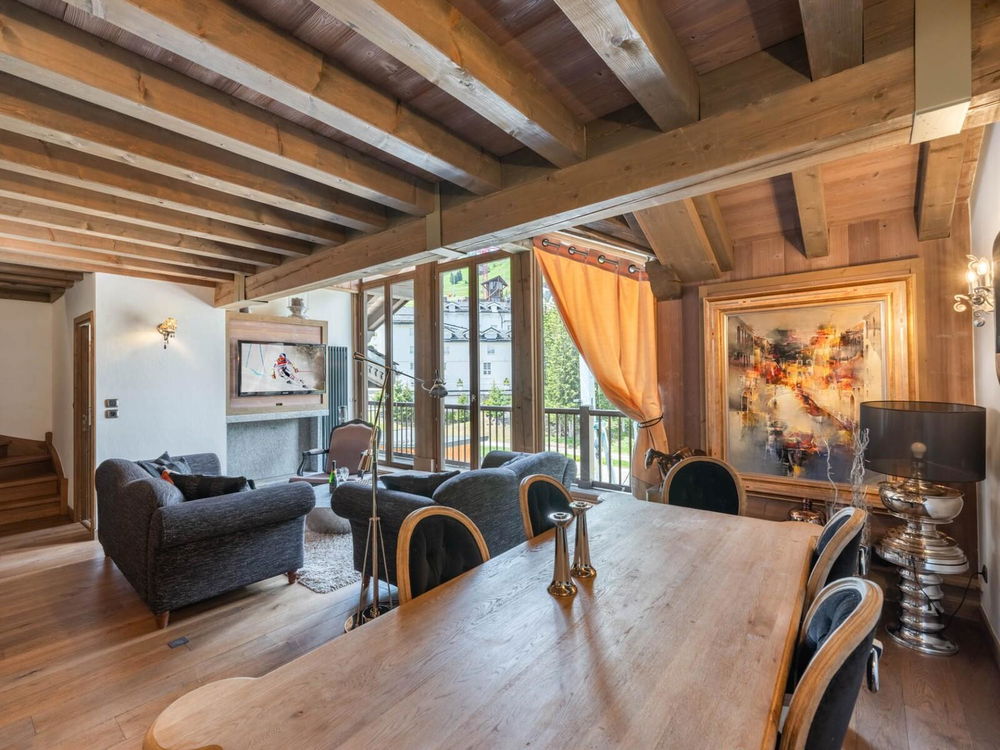 Experience mountain excellence with this prestigious top-floor apartment in Courchevel 2497696208