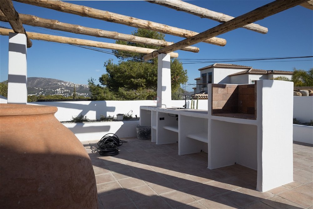 A new Ibiza-style villa is for sale in Benimeit, Moraira. 2359774986